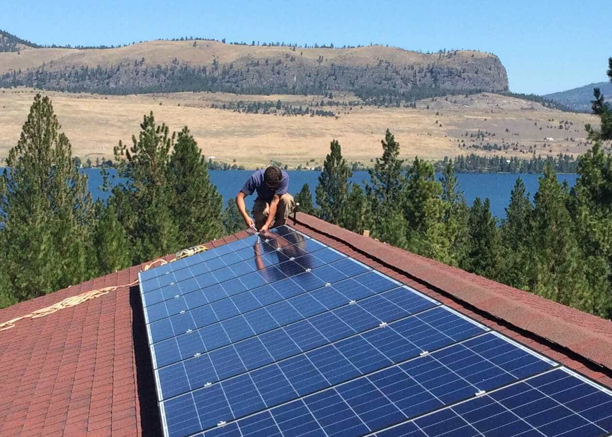 Skyler working on a roof in Big Arm