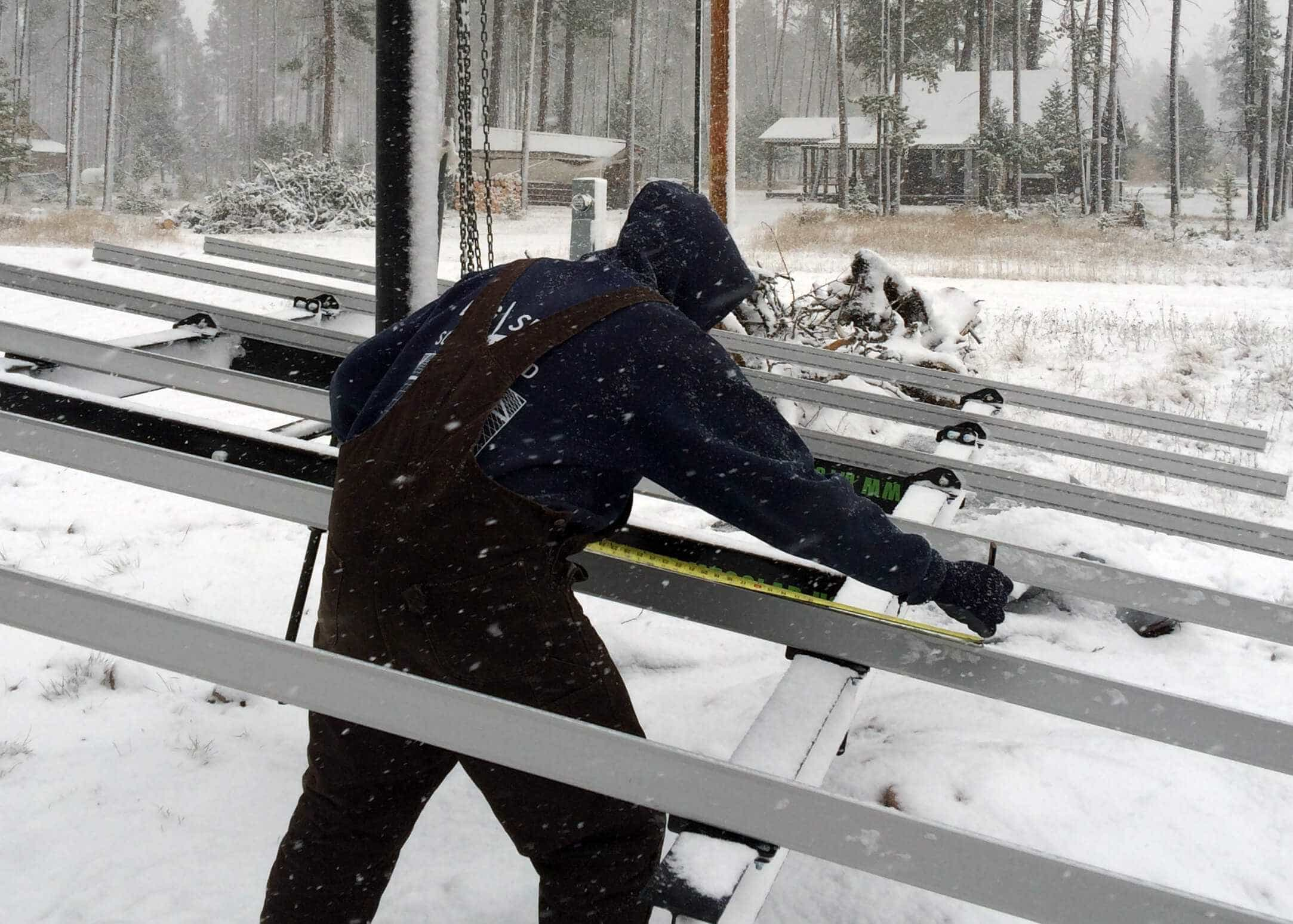 Steven Fisher working on a pole mount solar system in Montana